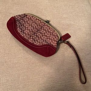 Coach burgundy wristlet with snap closure 7 1/4” x 4 3/4”